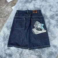 Harajuku style loose denim shorts with gothic pockets and cartoon design